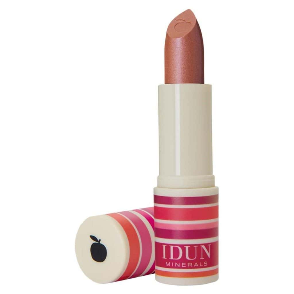 Läppstift från IDUN Minerals med skimrande färg i randig hylsa.