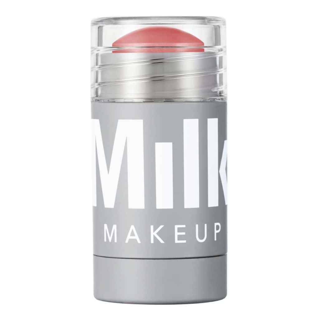 Stick från Milk Makeup i grå förpackning med röd nyans i toppen.
